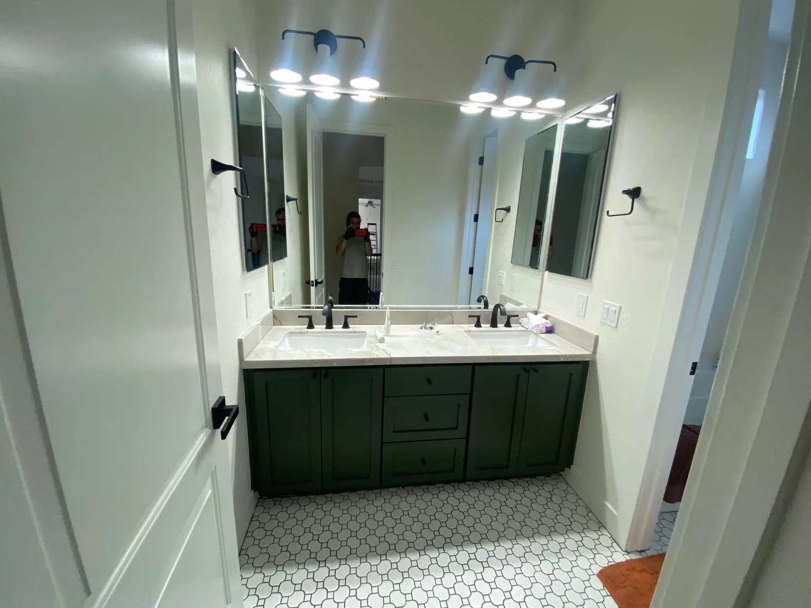 Luxury bathroom with custom tile and modern fixtures