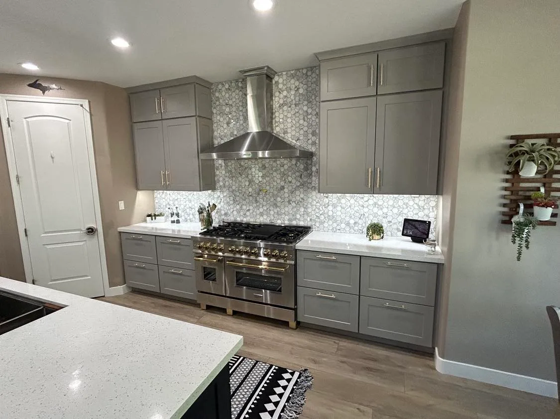 Open-concept kitchen with large center island and pendant lighting